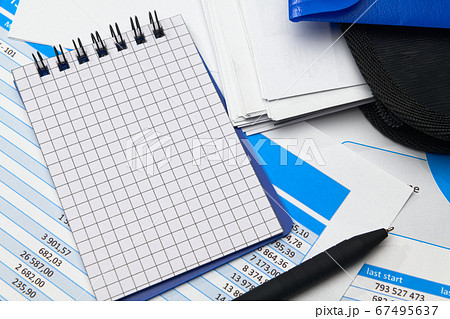 business office desk closeup - financial reports, business office desk closeup - financial reports, 67495637
