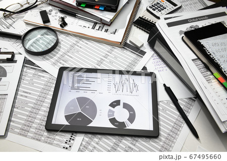 business office desk closeup - tablet computer 67495660