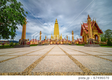The scenery of the Wat Bang Thong temple (golden pagoda) at Krabi province, Thailand. 67496070