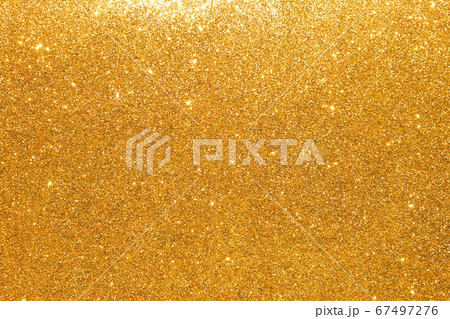 sparkles of golden glitter abstract background	 67497276