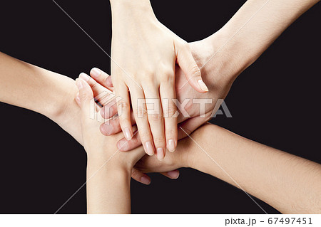 重ねる手の写真素材