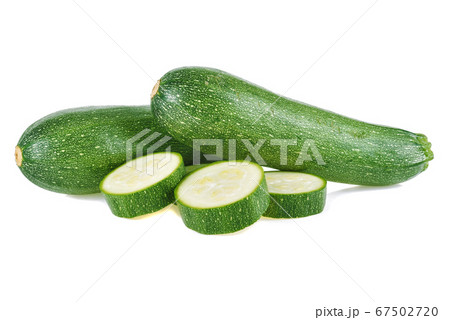 fresh green zucchini with slice isolated on white 67502720