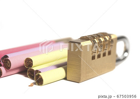 Colorful cigarettes and a padlock.Tobacco 67503956