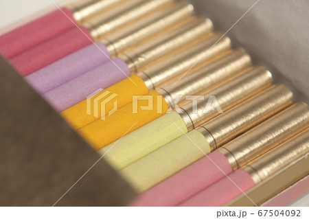 Box of colorful cigarettes close up . 67504092