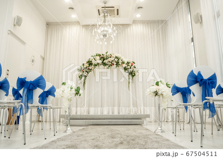 Bright room for weddings. Rows of guest chairs 67504511