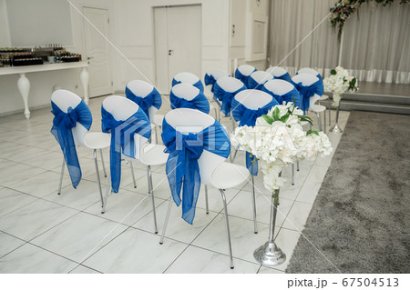 Bright room for weddings. Rows of guest chairs 67504513