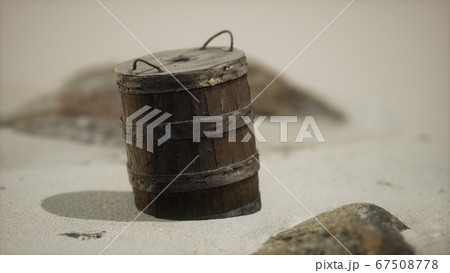 old wooden basket on the sand at the beach old wooden basket on the sand at the beach 67508778