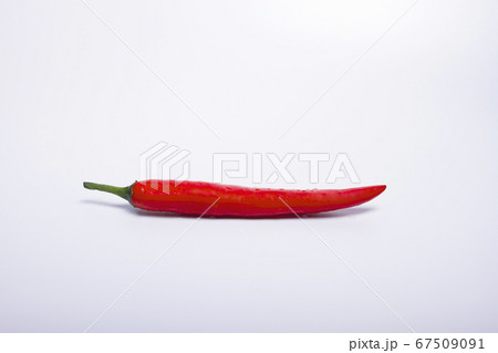 Fresh red chillies with water dripping on seeds 67509091