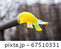Lost children's multi-colored wool glove awaits the owner 67510331