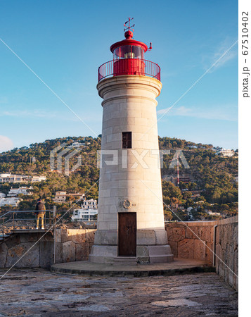 Lighthouse at Port d'Andratx. Popular  tower 67510402