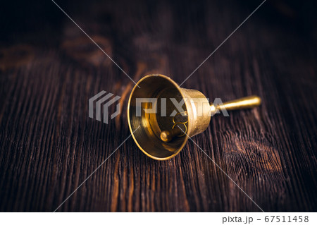 Antique brass hand bell Antique brass hand bell 67511458
