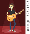 Man Play Acoustic Guitar on Red Spotlight 67521506