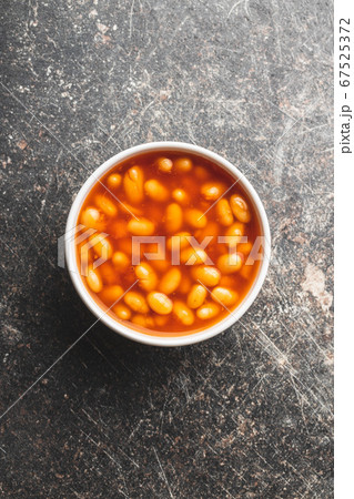 Baked beans in bowl. Beans with tomato sauce 67525372