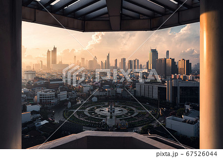 Sunrise over Bangkok city with Wongwianyai 67526044