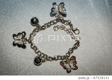 Bracelet with silver charms 67528131