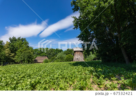 Wooden mill in the countryside. 67532421