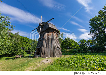 Wooden mill in the countryside. 67532426