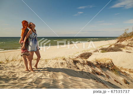 two lesbians hugging two lesbians hugging 67535737