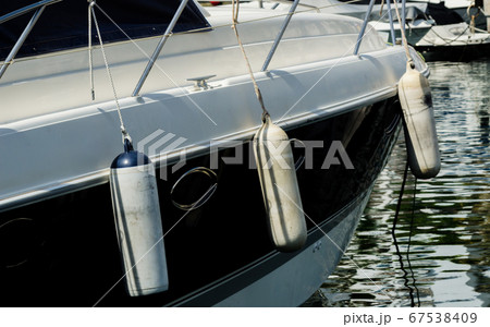 buoy hanging outside the hull of the boat, boat 67538409