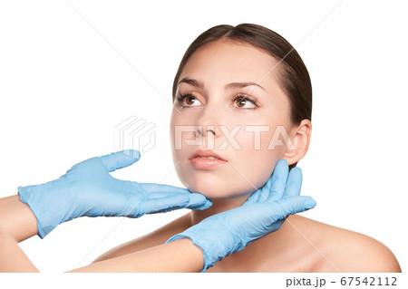 Aesthetic skin consultation. Patient and doctor gloves. Cosmetology treatment Aesthetic skin consultation. Patient and doctor gloves. Cosmetology treatment 67542112