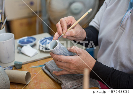 painting on vase ,Lampang in Thailand 67548355