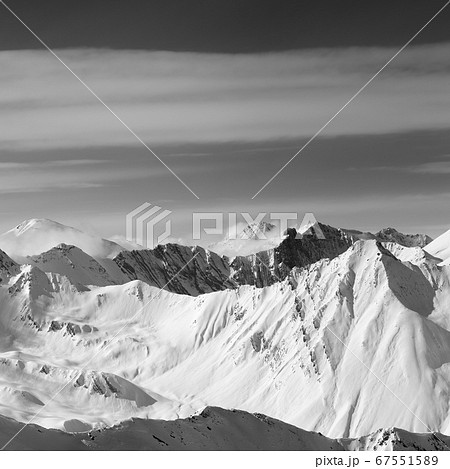 Black and white view on snowy high mountains in Black and white view on snowy high mountains in 67551589