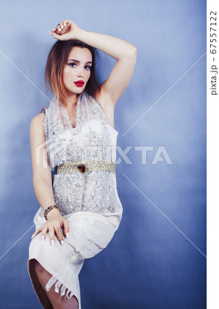 young pretty blond woman wearing lot of luxury rich jewelry and fashion style makeup, lifestyle beauty people concept young pretty blond woman wearing lot of luxury rich jewelry and fashion style makeup, lifestyle beauty people concept 67557122