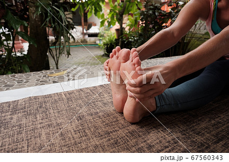 Detail of caucasian woman doing yoga asana 67560343