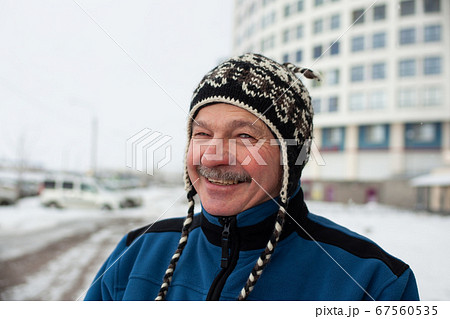 Portrait of mature man outdoors in winter Portrait of mature man outdoors in winter 67560535