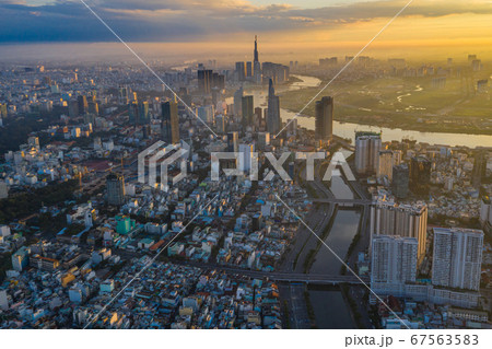 Aerial cityscape view of Saigon city under beautiful sunset, Vietnam  67563583
