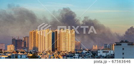 Dramatic scenery of buildings with smoke for city pollution concept 67563646