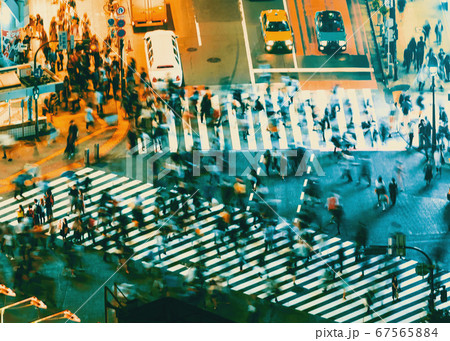 People and traffic cross the famous scramble intersection in Shibuya, Tokyo, Japan People and traffic cross the famous scramble intersection in Shibuya, Tokyo, Japan 67565884