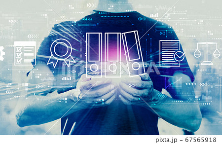 Compliance theme with man holding smartphone Compliance theme with man holding smartphone 67565918