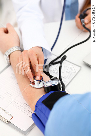 Female doctor arms make medic procedure closeup 67569817