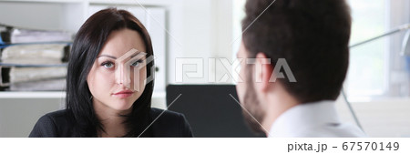 Beautiful brunette businesswoman portrait at workplace 67570149