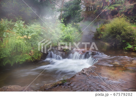 Hot waterfall 67579202