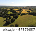 Aerial view to a meadow near Tonbrodge, Kent, UK. British aerial green view of the countryside. 67579657