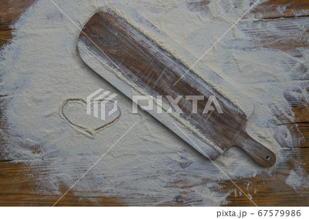 White flour on old rustic wooden table, top view. 67579986