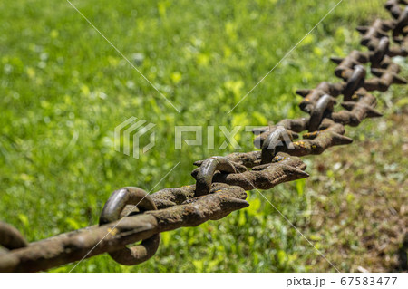 Railings from an ancient metal chain. Closeup of Railings from an ancient metal chain. Closeup of 67583477