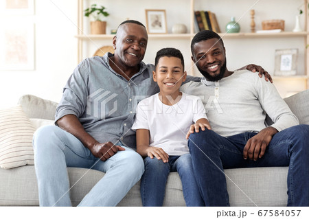 Three Age Black Male Family. Father, Son And Grandfather Posing At Home Three Age Black Male Family. Father, Son And Grandfather Posing At Home 67584057