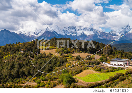 Meili snow mountain in background in Deqen, Shangri-la country,  Yunnan province, China 67584859