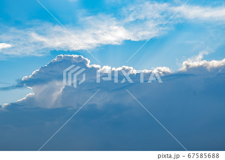 the clouds are Cumulus type with the light of the sun 67585688