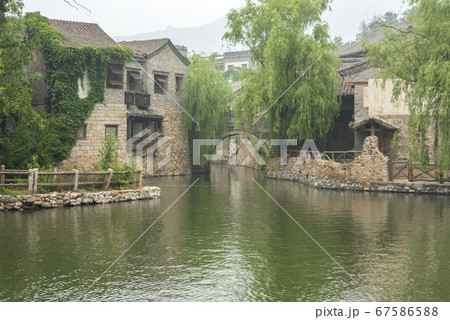 Medieval european town in the bank of a river Medieval european town in the bank of a river 67586588