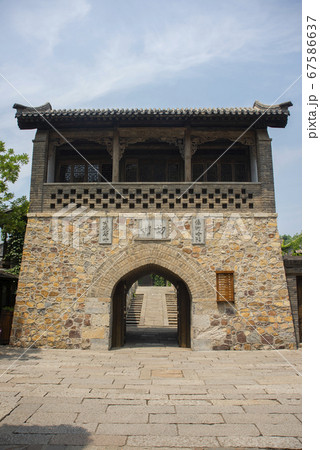 Historical asian temple with chinese ieroglifs on it 67586637