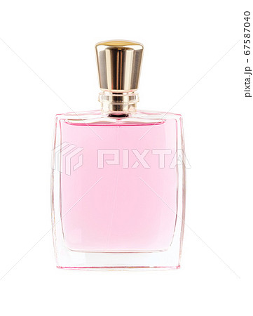 Perfume or scented toilet water in a rectangular transparent glass bottle with a golden lid isolated 67587040