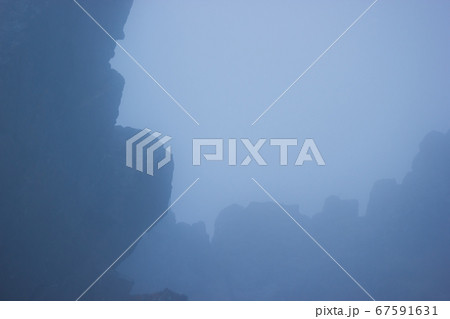 mountain peaks in morning fog mountain peaks in morning fog 67591631