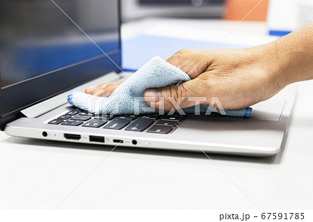 Concept Prevention cleaning frequently, Focus on the high traffic areas that enable pathogens to spread around the computer equipment such as keyboards of laptop computer Concept Prevention cleaning frequently, Focus on the high traffic areas that enable pathogens to spread around the computer equipment such as keyboards of laptop computer 67591785