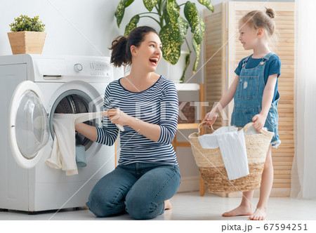 family doing laundry family doing laundry 67594251