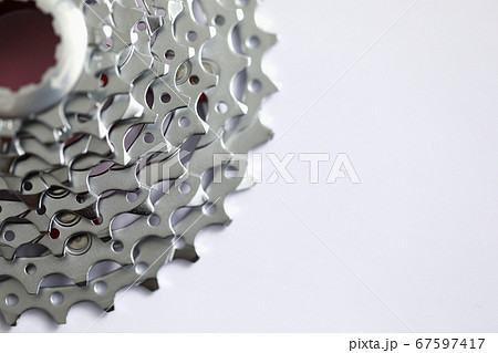 Shiny serrated metal gear in round set Shiny serrated metal gear in round set 67597417