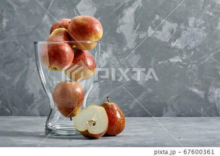 Group of ripe juicy pears on concrete surface 67600361